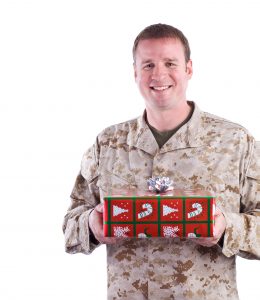 Marine Holds a Christmas Gift